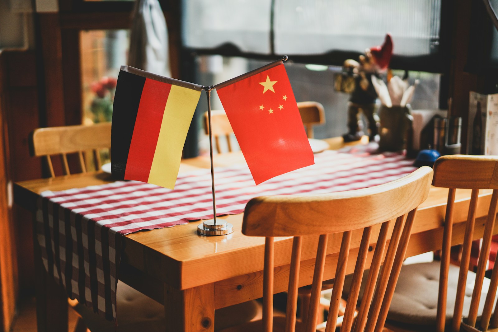 a table with two flags sitting on top of it